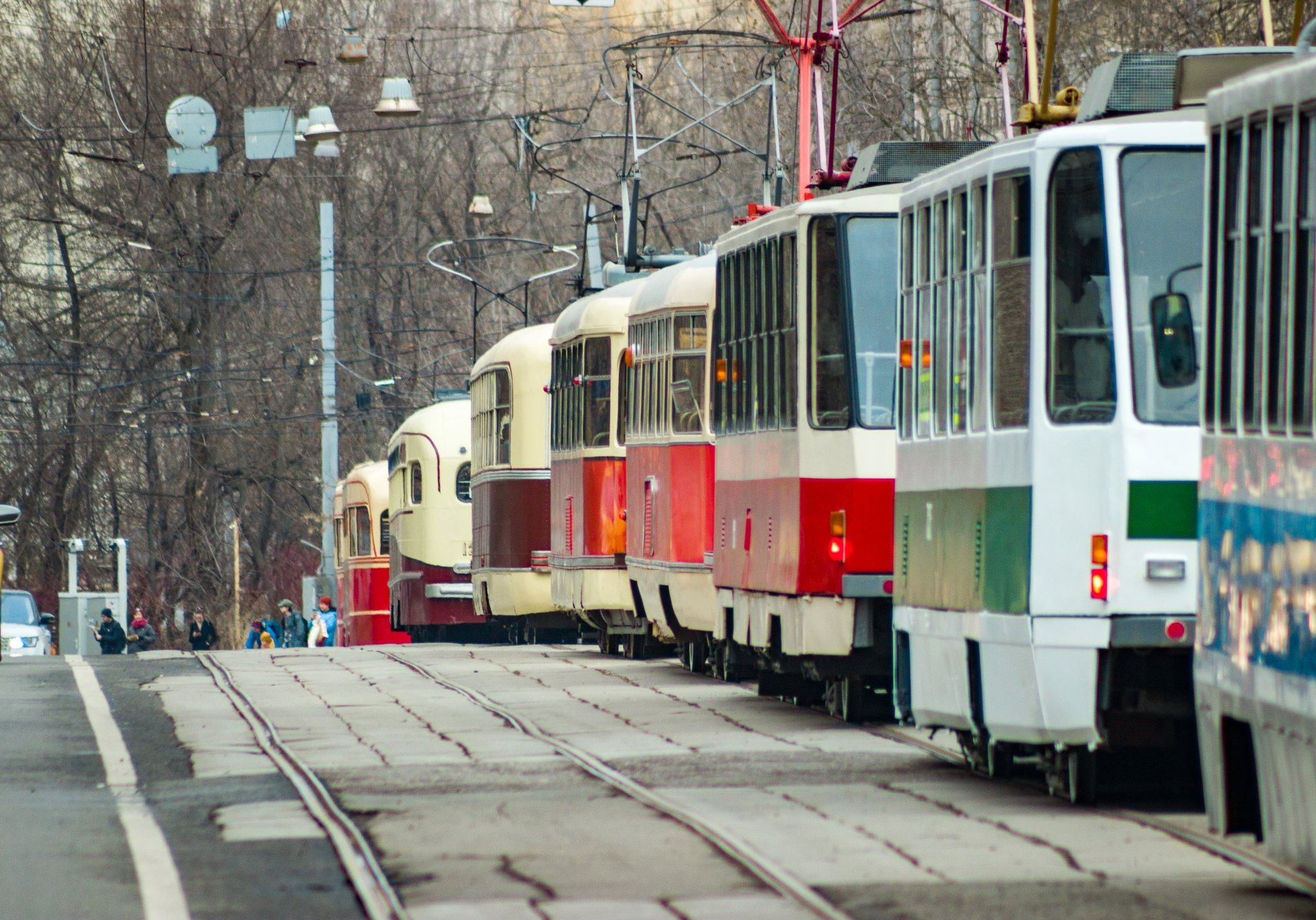 Column of retro trams passes along Lesnaya Street in Moscow.