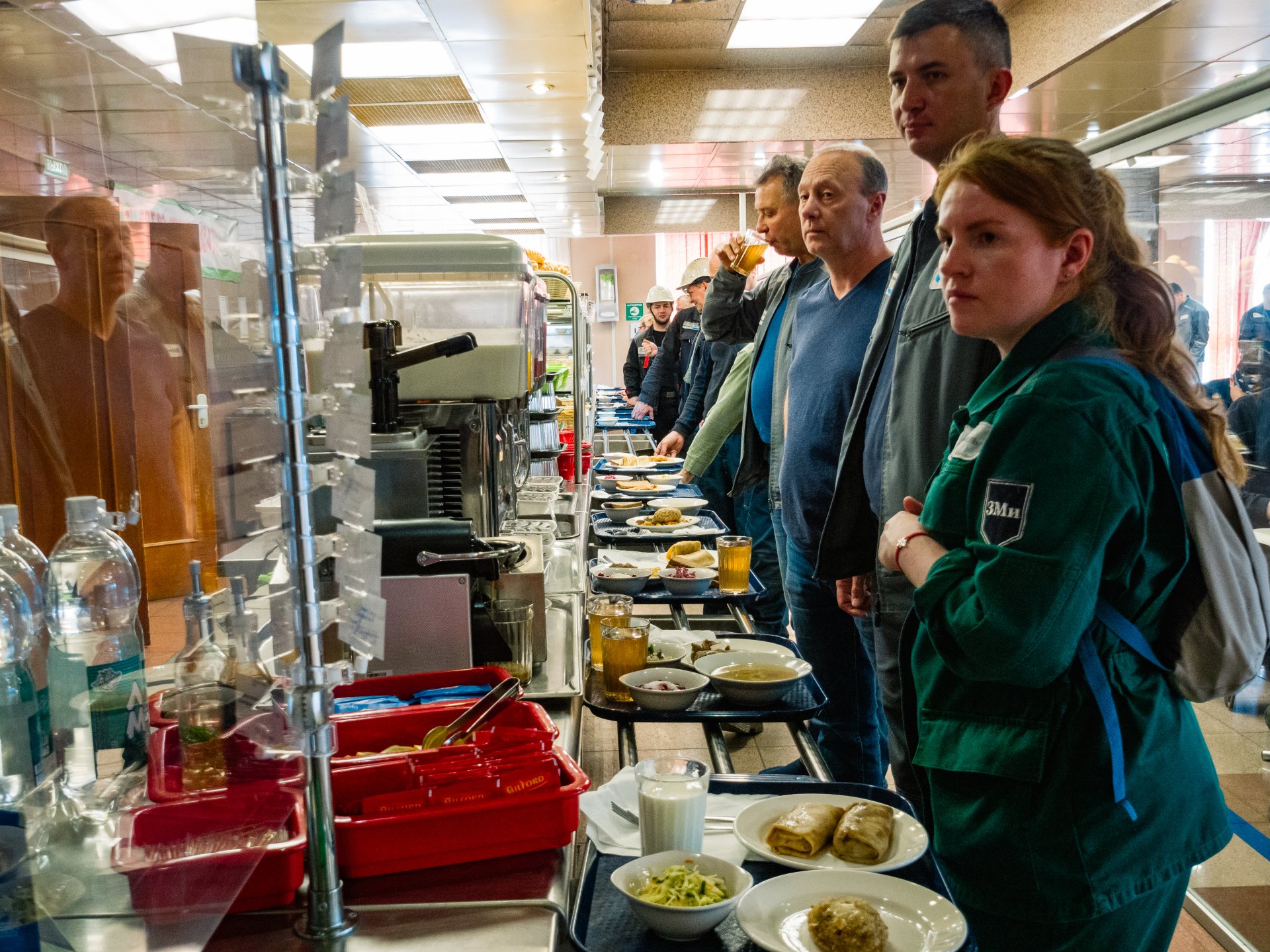 Workers of the Copper plant in the dining room choose lunch dishes.