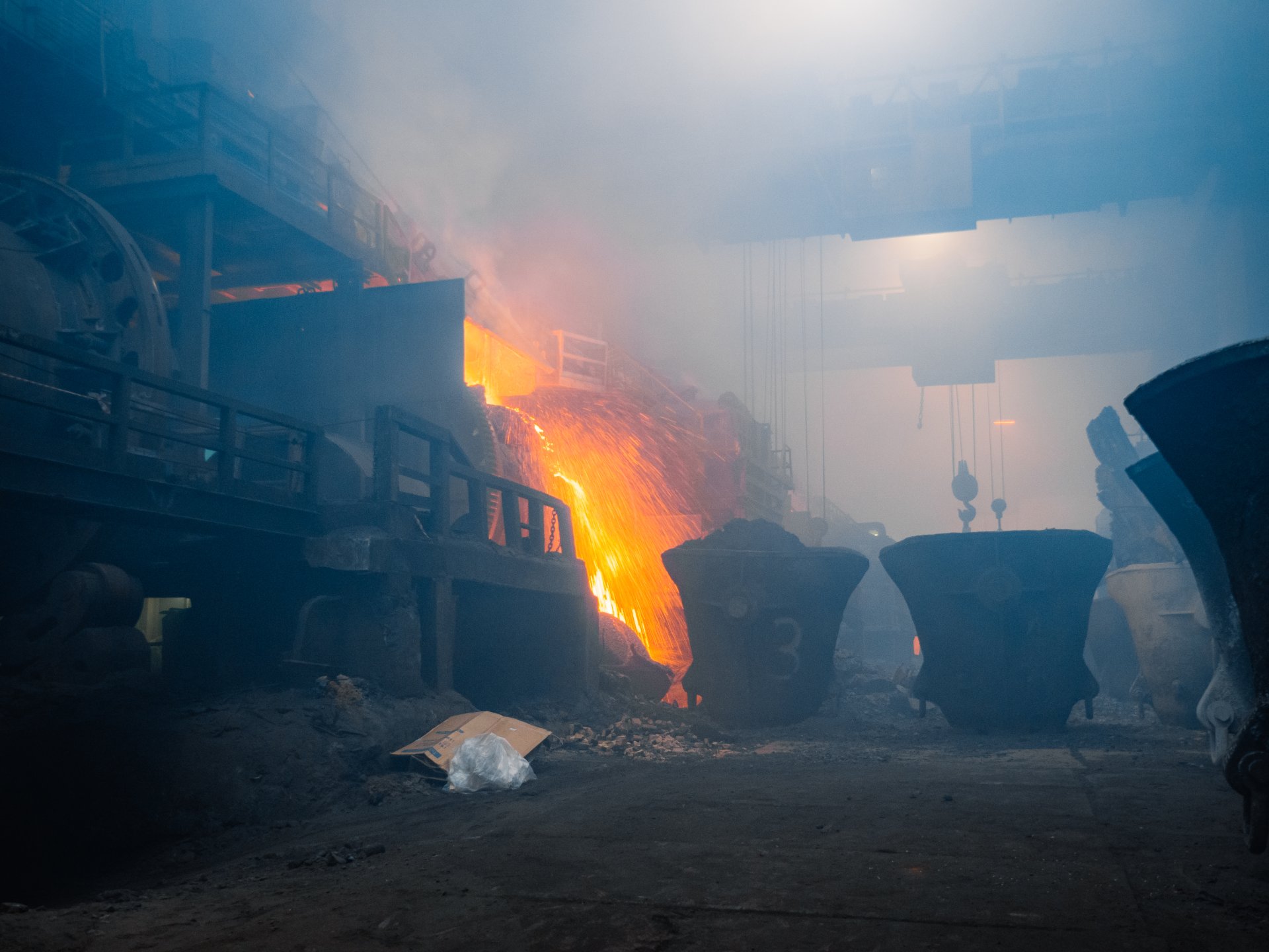 Blast furnaces melt copper ore at extremely high temperatures.