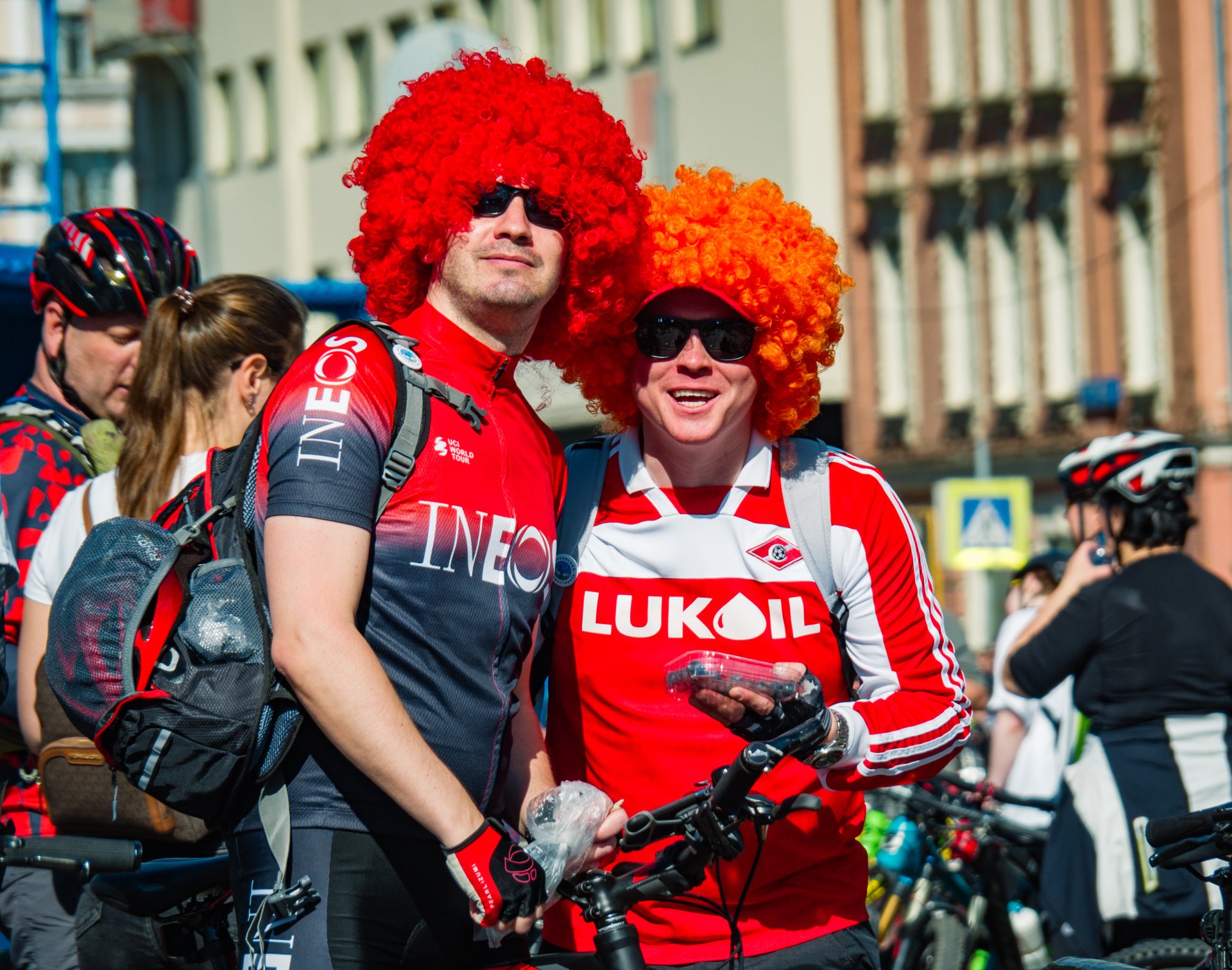 Men in bright wigs.