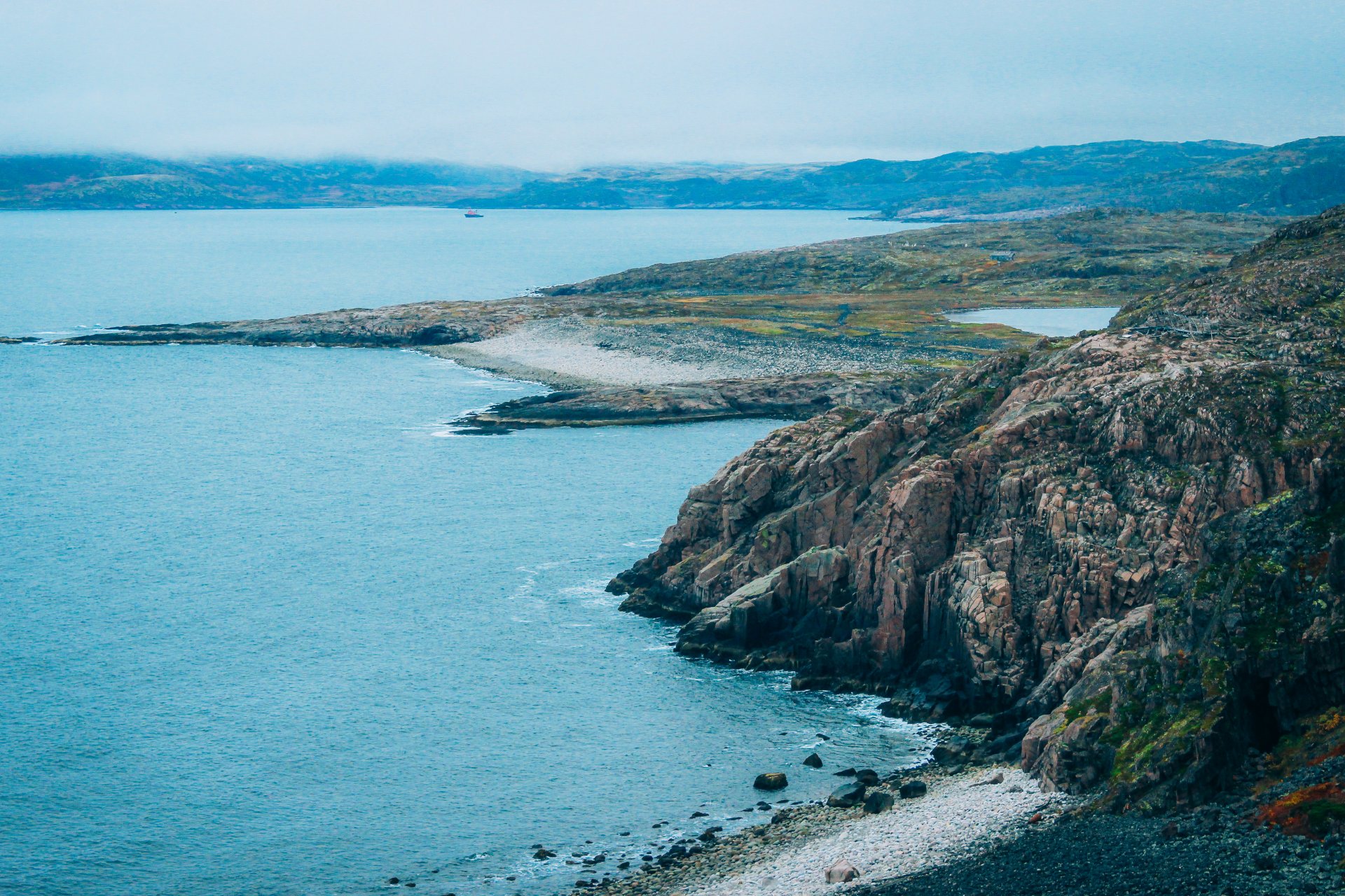 The coast of the Barents Sea, which is part of the Arctic Ocean. The real edge of the Earth.