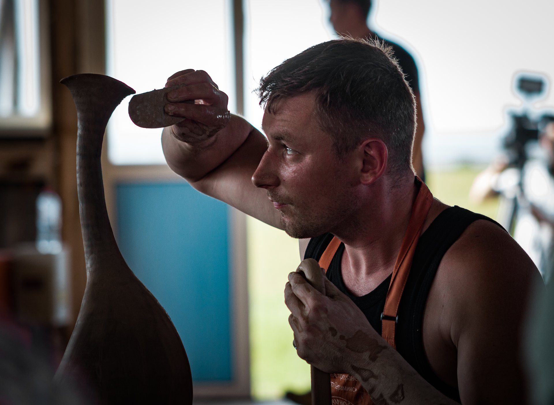 Now Mikhail owns his own school of pottery.