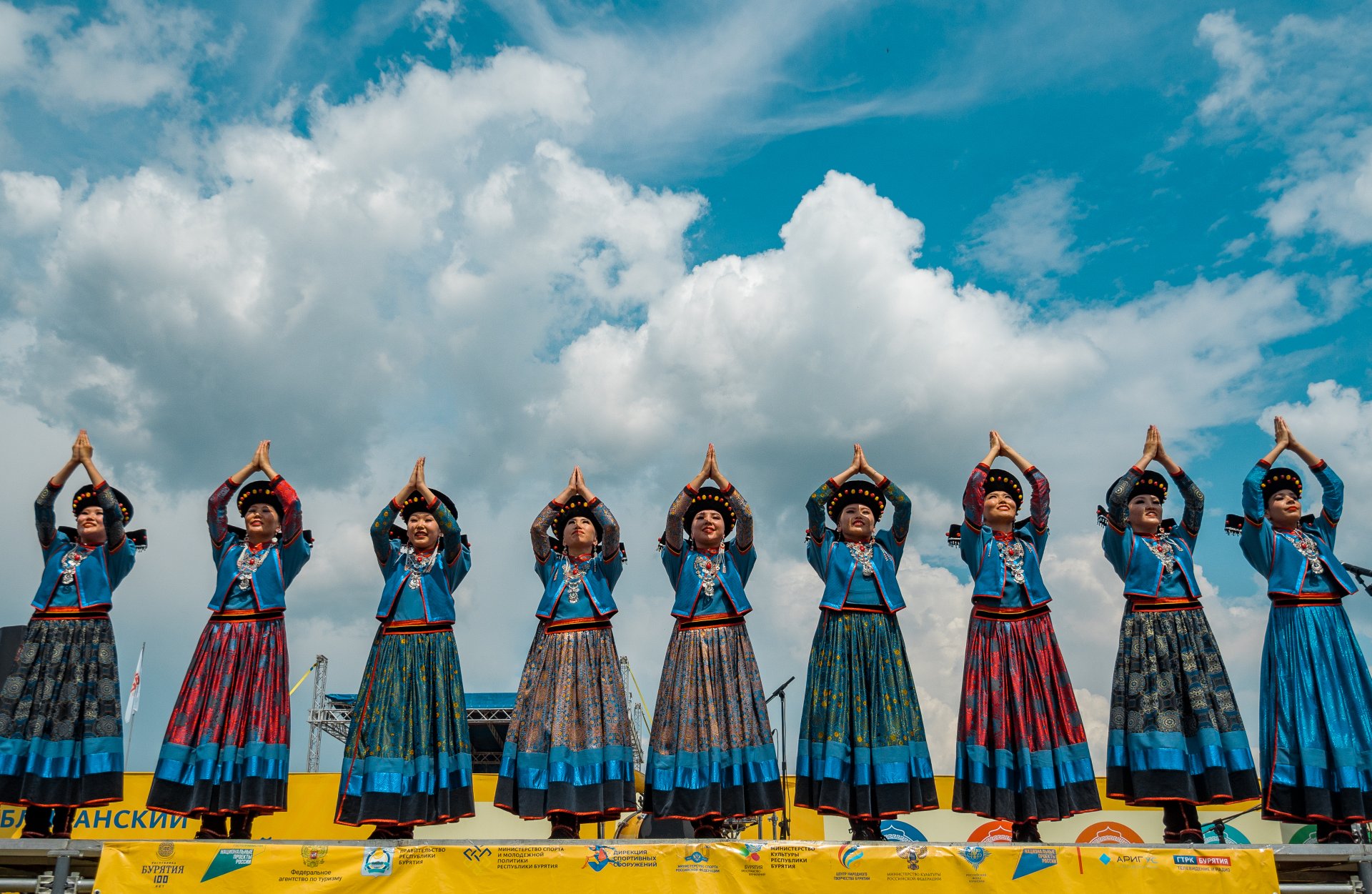 Performances by dance groups in traditional costumes.