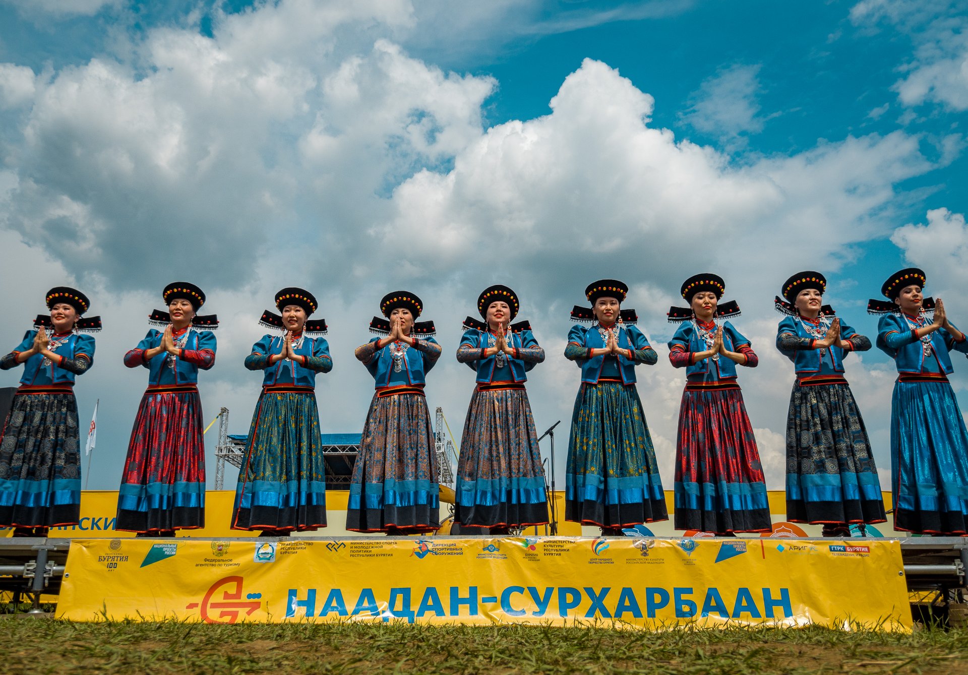 Performances by dance groups in traditional costumes.