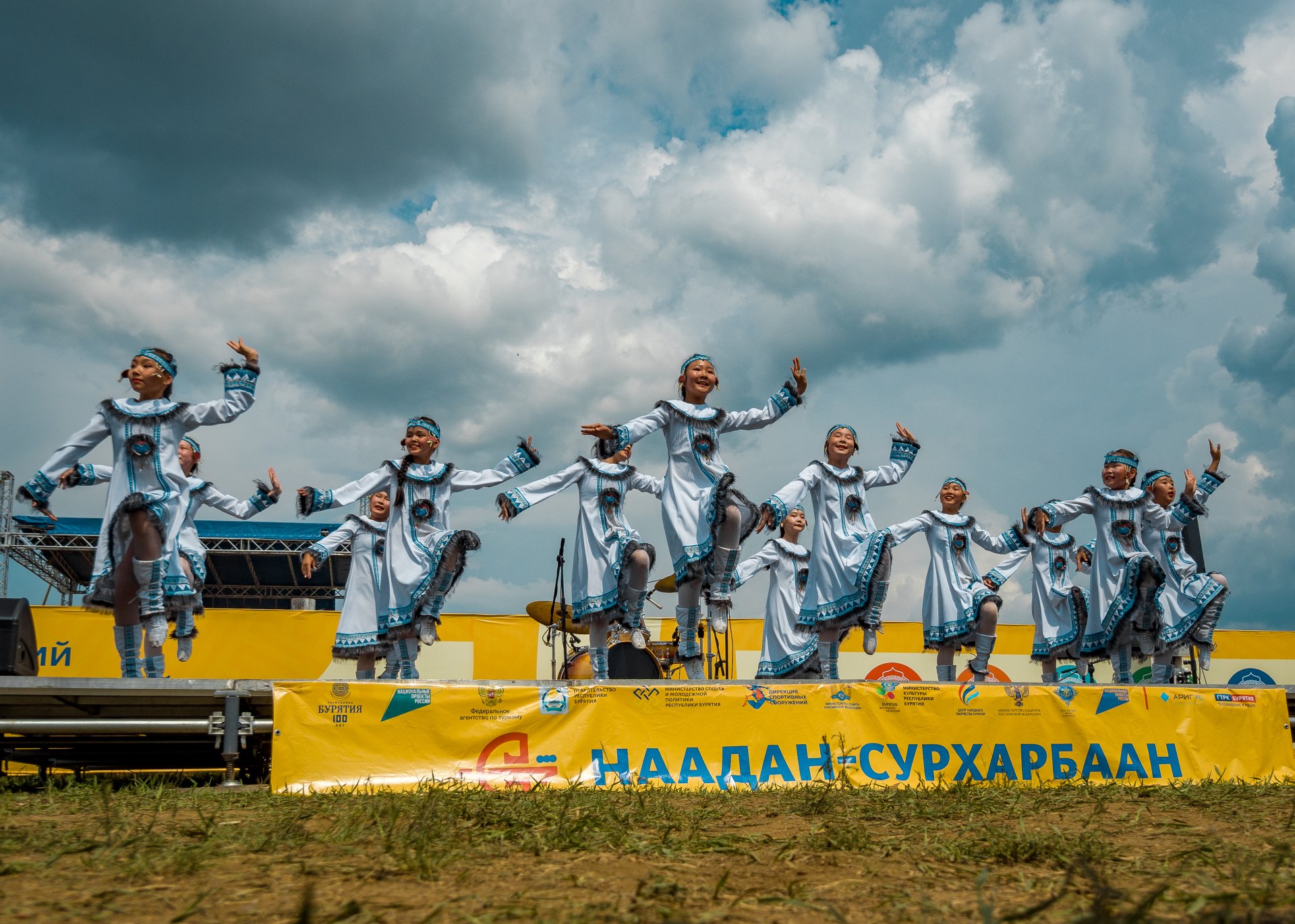 Performances by dance groups in traditional costumes.