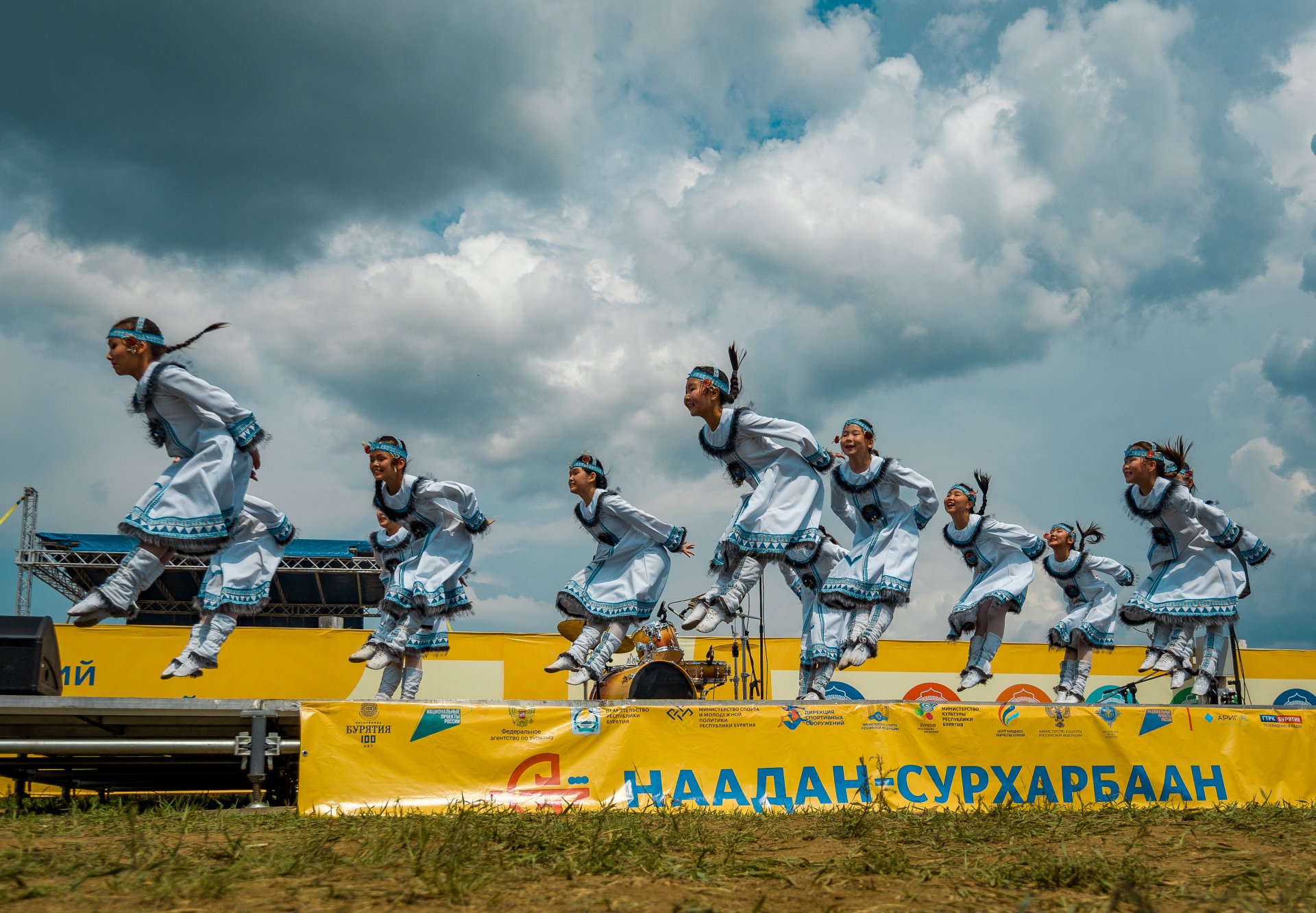 Performances by dance groups in traditional costumes.