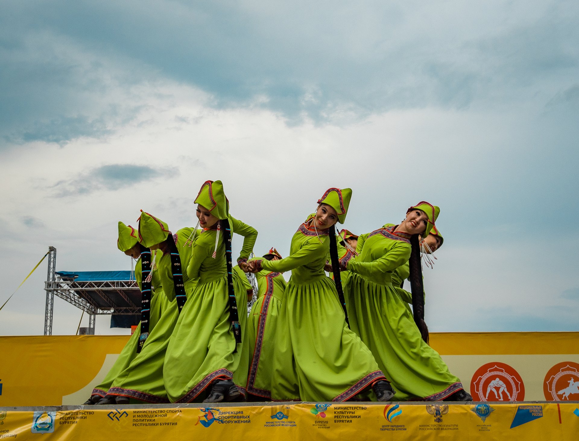 Performances by dance groups in traditional costumes.