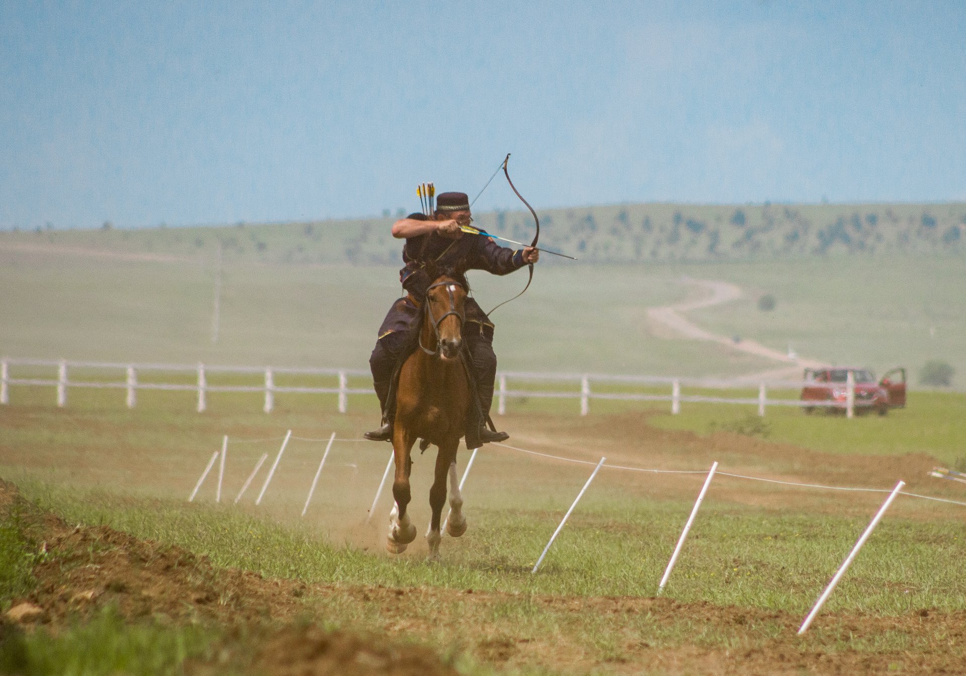 Demonstration performances in archery on horseback.