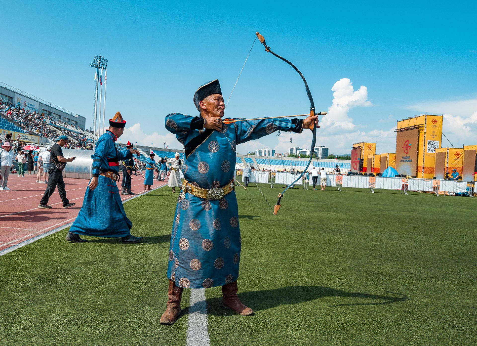 "Surharbaan" is translated from the Buryat language as "shooting at sur" - a leather target. Targets for archery were made from a leather belt - "sur". Then this name was transferred to other leather targets, and the competition for shooting at sur - Sur-harban - became the name of the entire holiday.