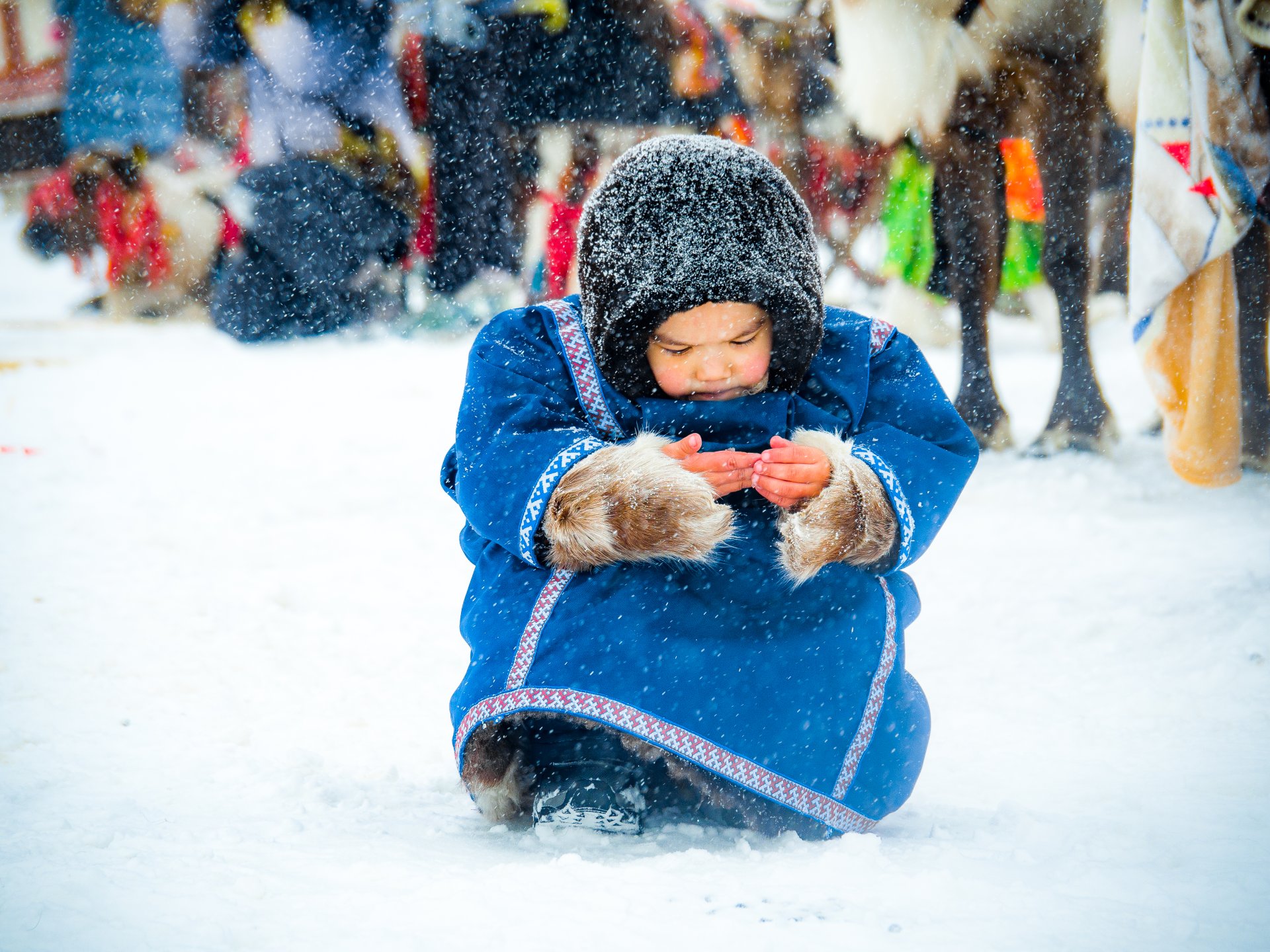Reindeer herder’s children get used to the extremely low temperatures of the Far North from an early age.