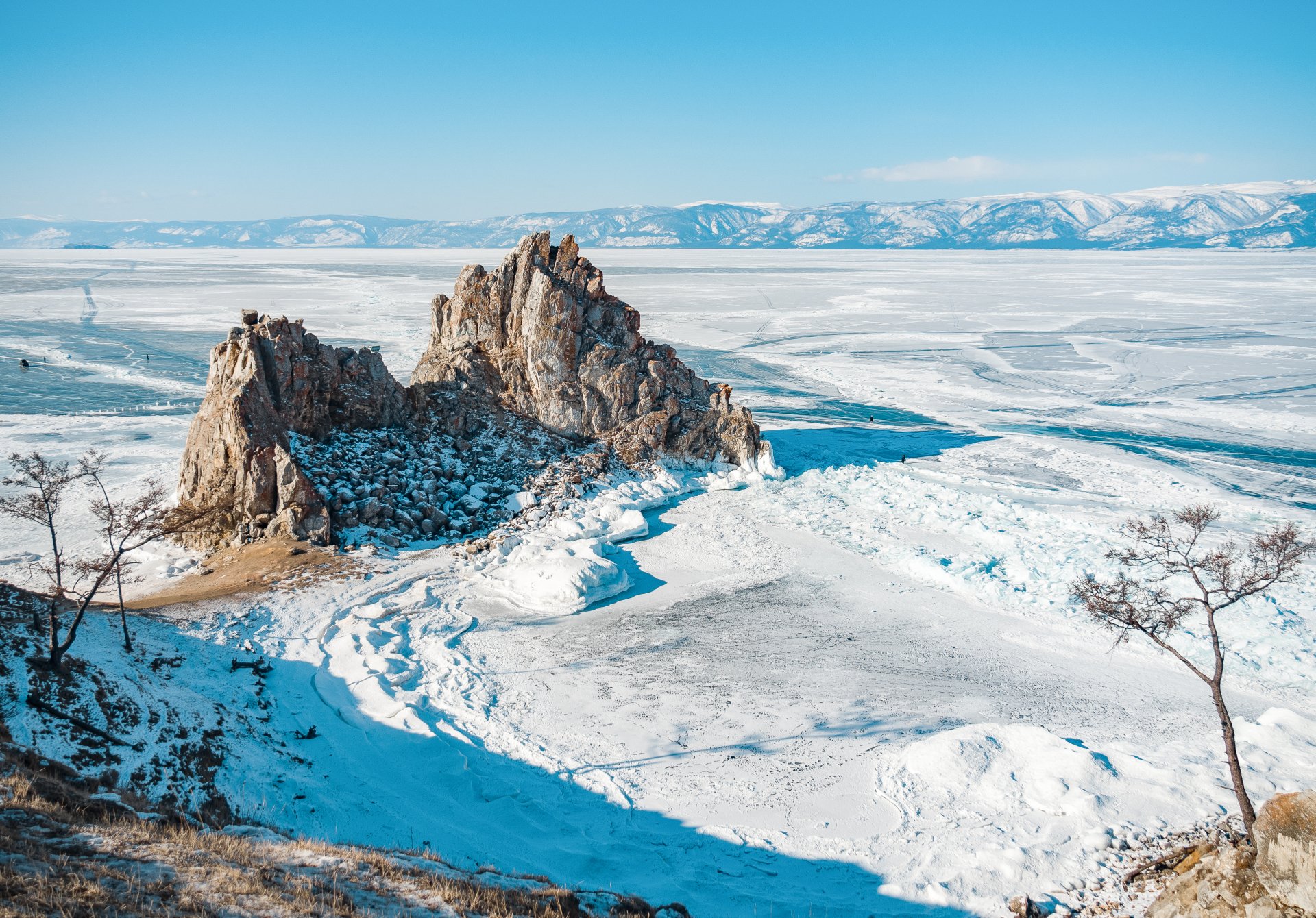 Olkhon Island, Cape Burhan, Shamanka Rock is one of the nine shrines of Asia (formerly called the "temple stone") In ancient times, cult sacrifices were made at Shamanka Rock to the spirit-master of Olkhon Island, who lived in a cave. The owner of Olkhon was the most formidable and revered deity of Lake Baikal. The sacred Shaman rock with a through cave, where only the shaman had the right of access, remained forbidden for a long time, no one was allowed to approach it or pass through it. Previously, women were forbidden to approach the rock.
