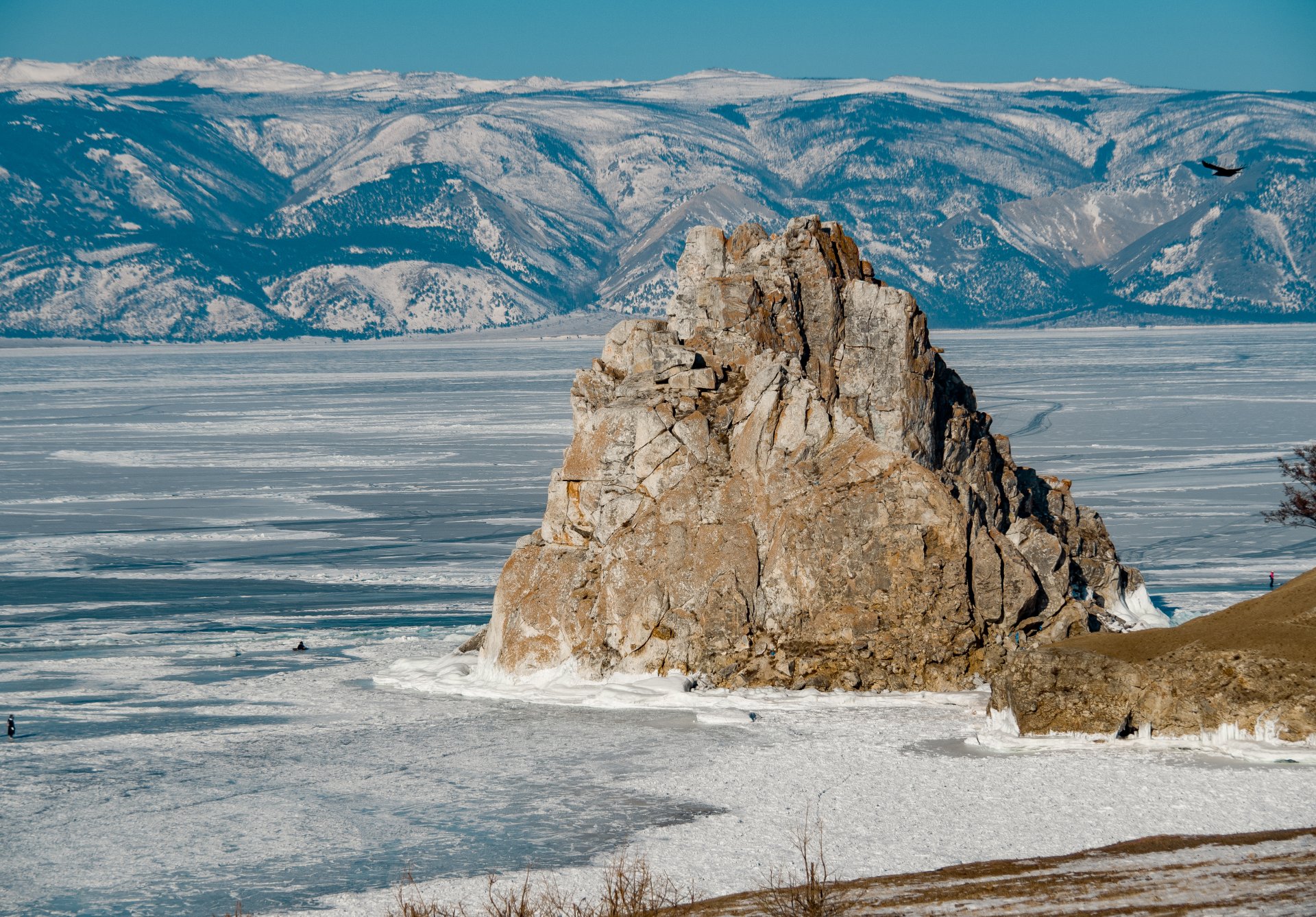 Olkhon Island, Cape Burhan, Shamanka Rock is one of the nine shrines of Asia (formerly called the "temple stone") In ancient times, cult sacrifices were made at Shamanka Rock to the spirit-master of Olkhon Island, who lived in a cave. The owner of Olkhon was the most formidable and revered deity of Lake Baikal. The sacred Shaman rock with a through cave, where only the shaman had the right of access, remained forbidden for a long time, no one was allowed to approach it or pass through it. Previously, women were forbidden to approach the rock.
