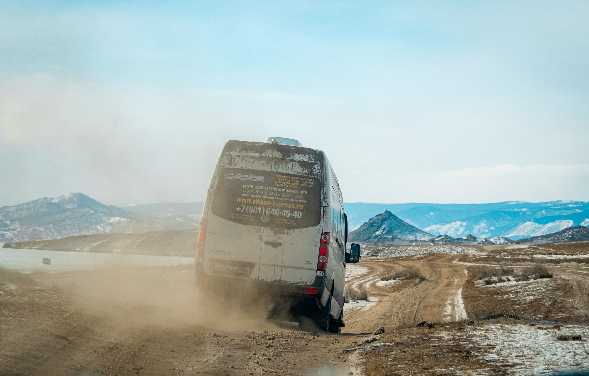 A bus from Olkhon-Express company on the road from Irkutsk to Olkhon Island.