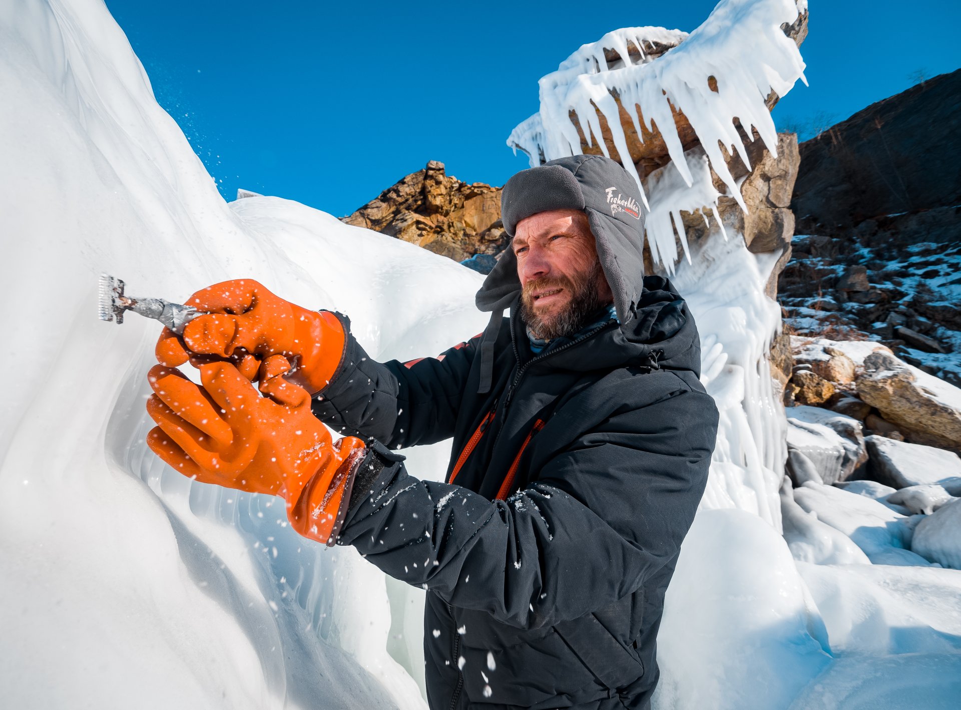 Sculptor, twenty-seven-time winner of various international championships for the creation of ice figures Alexander Parfenov at work.