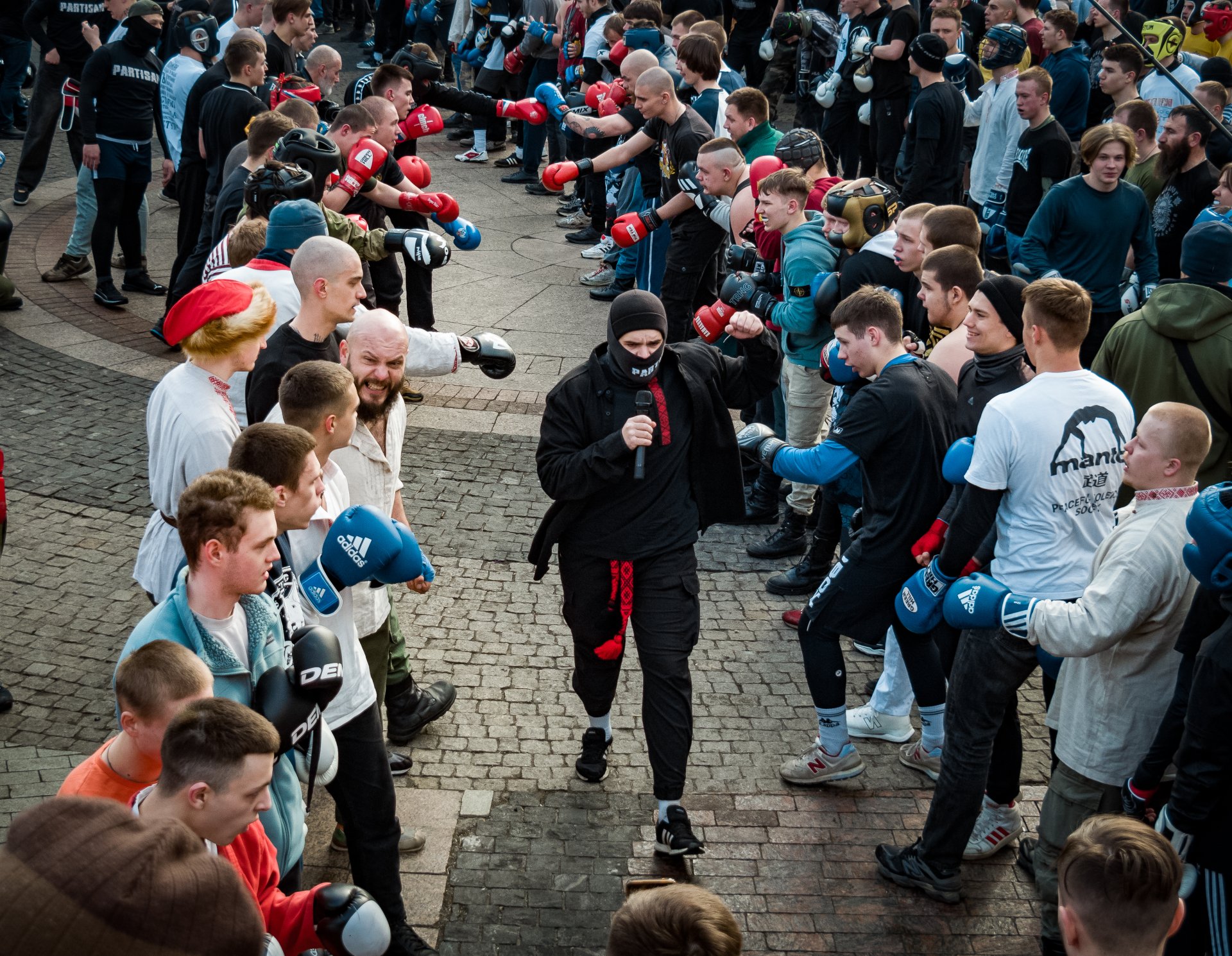 Ivan, one of the organizers of the Fist Fights, walks between the rows, a second before the start.