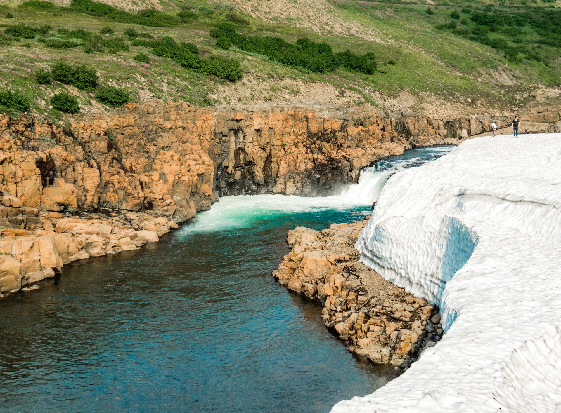 The Putorana plateau is located on the territory of permafrost. Here, even in the 30-degree heat, the snow never melts in summer.