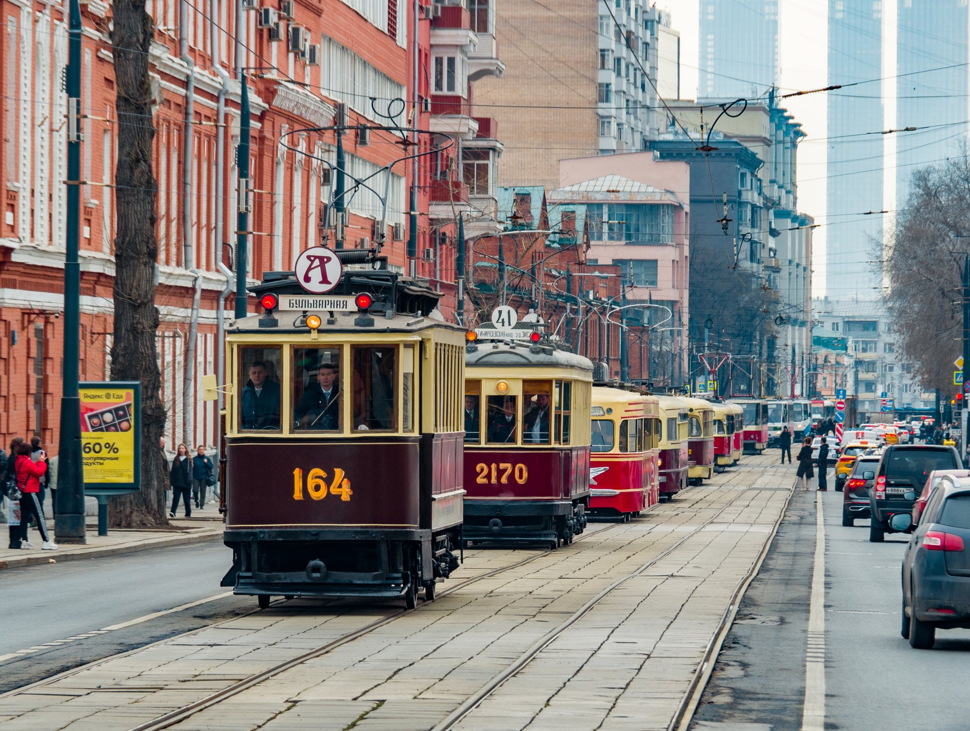 Column of retro trams passes along Lesnaya Street in Moscow.